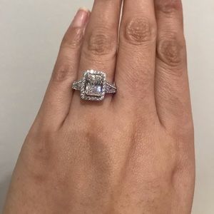 New silver emerald cut halo engagement ring